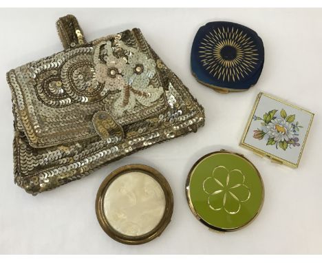 A ladies vintage evening bag with sequin and bead decoration.  Together with 3 vintage compacts, 1 Stratton's and a small dou