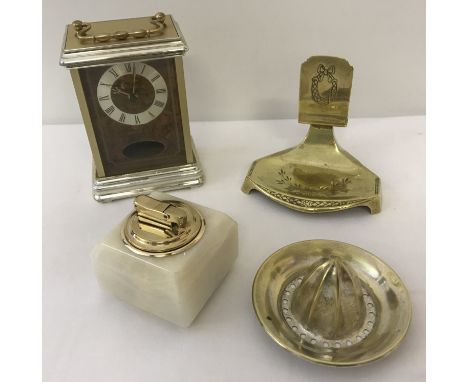 A small collection of assorted misc. items.  Comprising: An Estyma Quartz carriage clock, an onyx Colibri table lighter, a vi