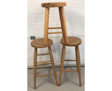 3 vintage pine stools. A pair of high stools with turned detail to legs together with one other.  