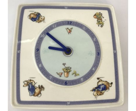 A Wedgwood Beatrix Potter's Peter Rabbit ceramic wall clock.  With modern battery movement.  Approx. 20 x 20cm.