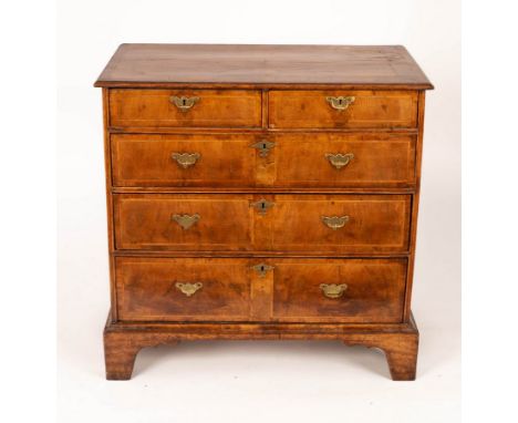 An 18th Century walnut chest of three long and two short drawers on bracket feet, 90cm wide CONDITION REPORT: Top with splits