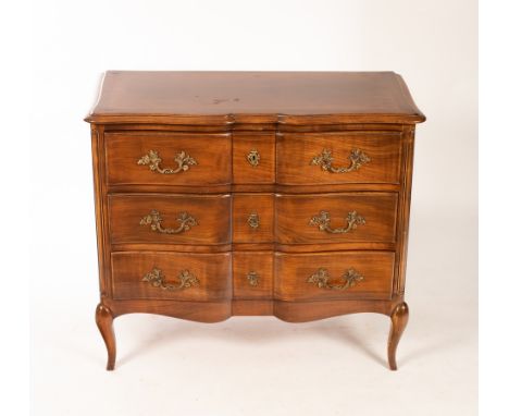 A French walnut commode, the serpentine front fitted three long drawers, 94.5cm wide CONDITION REPORT: Condition information 