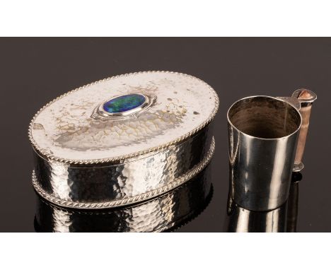 A small silver cup, Helen Newman, Birmingham 1982, with shell handle, 5cm high and a Cambray Ware oval box with enamel oval c