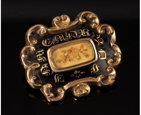 An early Victorian mourning brooch, in yellow metal and black enamel, the reverse inscribed 'My Beloved Husband Ob't 26th May