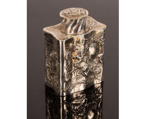 A Continental white metal tea caddy and cover, embossed a pianist to one side and violinists to the other, 13cm high CONDITIO