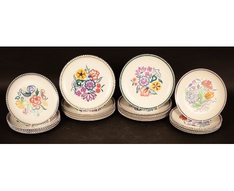 Poole Pottery, twelve floral decorated dinner plates, 25.5cm diameter and ten smaller floral plates, 23cm diameter CONDITION 