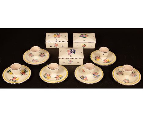 Poole Pottery, six floral decorated egg cups and three floral lidded boxes, 11cm x 8cm CONDITION REPORT: Condition informatio