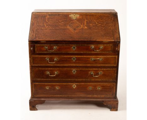A George III oak bureau fitted beneath the fall and with four drawers under, on ogee bracket feet, 91.5cm wide CONDITION REPO