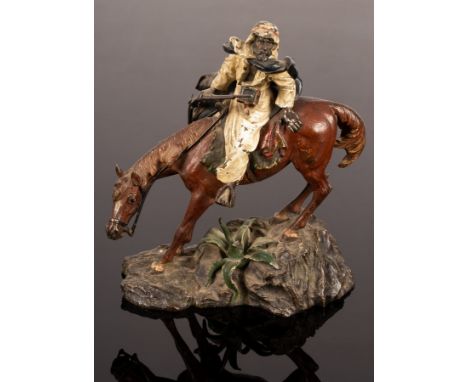 An Austrian cold painted bronze figure of an Arab horseman by Franz Bergmann, signed, 16cm high/see illustration CONDITION RE