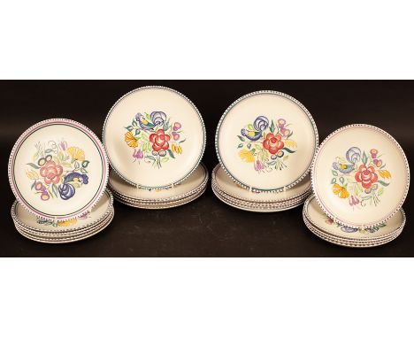 Poole Pottery, thirteen floral decorated dinner plates, 25.5cm diameter and eleven smaller floral plates, 23cm diameter CONDI