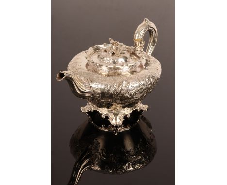 A William IV silver teapot, Edward, John, William & Edward Barnard, London 1836, with embossed decoration on anthemion feet, 