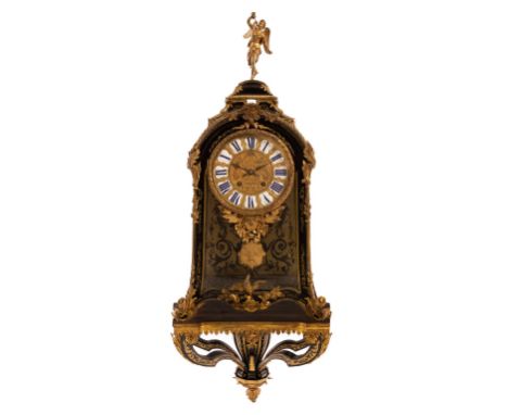 A 19th Century Boulle clock with bracket, the clock with angel finial, blue enamel numerals to the dial and with movement sig