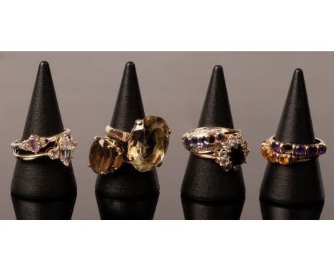 An imitation diamond three-stone ring set in 14k yellow gold, size S, a cocktail ring set in 14k gold and six 9ct gold gem se