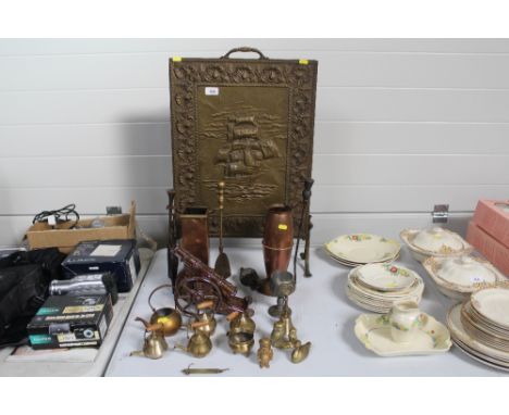 A brass fire screen; two companion stands; various brass ornaments etc