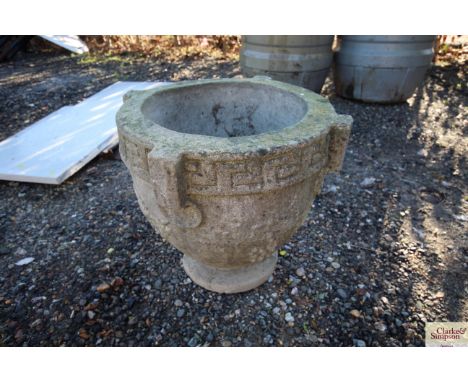 A concrete planter with Greek key decoration AF