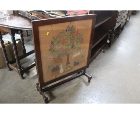 A needlework folding fire screen 