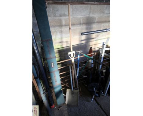 A small quantity of long handled gardening tools