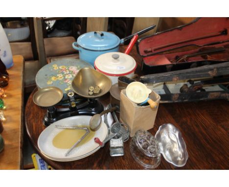 A set of kitchen scales; enamel saucepans; jelly mould; copper watering can etc