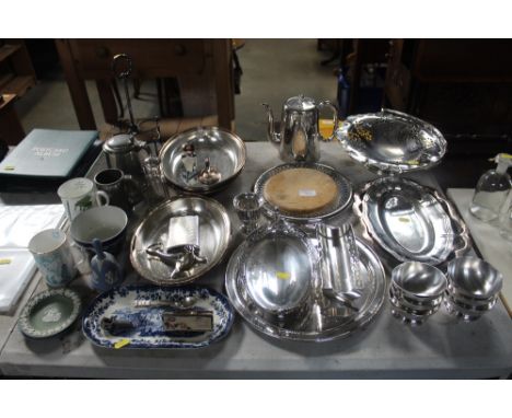 A collection of various silver plated ware to include a Christofle plated tray; tureens; bread plate; hip flask etc and a sma