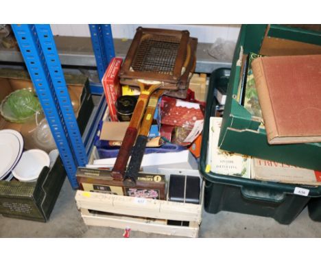 A box containing various sundry items to include two Dunlop tennis racquets; tins etc.