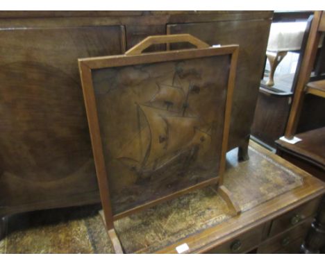 Arts and Crafts oak firescreen inset with an embossed leather panel of a galleon 