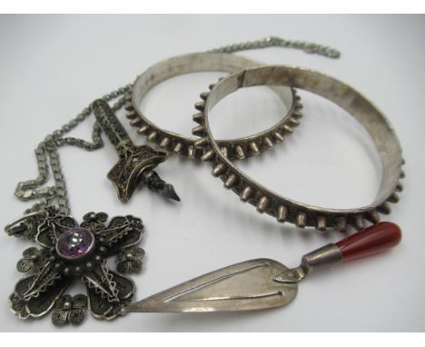 Filigree silver and amethyst pendant on chain, together with a filigree sword brooch, two silver bangles and a silver trowel 
