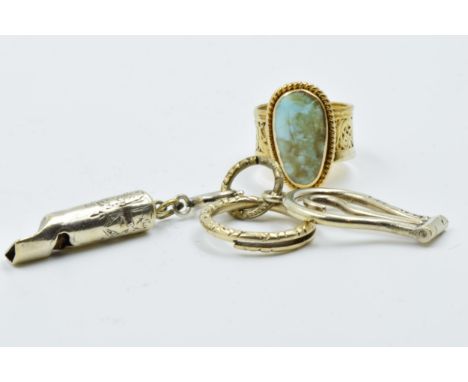 Yellow metal ring of pierced design set turquoise, together with a silver gilt dog whistle and button hook 