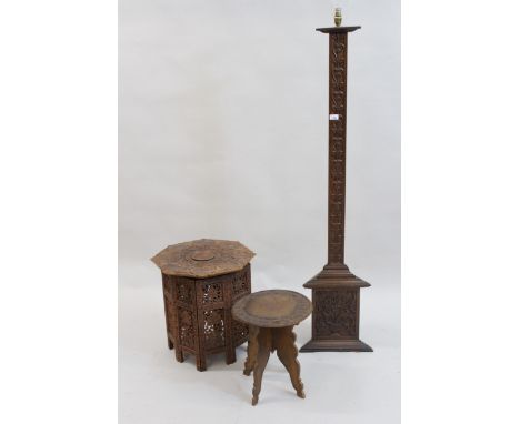 Indian carved hardwood lamp standard of triangular form together with a similar octagonal occasional table and smaller circul