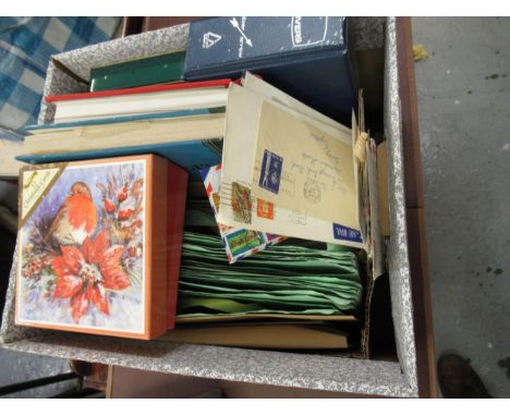 Two albums, a quantity of First Day covers and miscellaneous loose stamps 