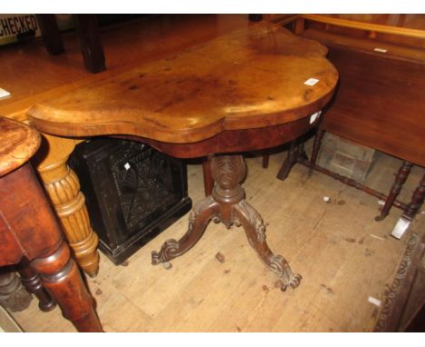 Victorian burr walnut shaped top fold-over card table, on carved column and tripod supports 