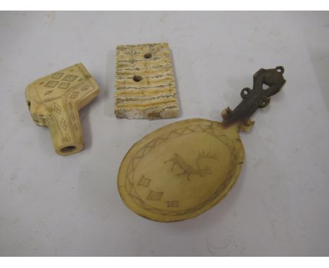 Inuit whale bone spoon, together with similar pipe bowl and a whale tooth segment 