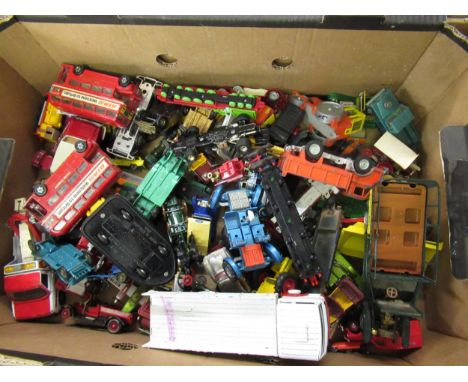 Box containing a quantity of various early playworn diecast metal vehicles including Dinky and Corgi 