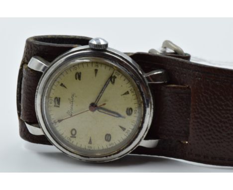 Gentleman's mid 20th Century stainless steel cased wristwatch by Breitling, the champagne dial with Arabic and baton numerals