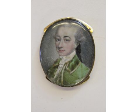 Late 18th / Early 19th Century miniature oval portrait of a dandy in red velvet jacket, mounted as a clasp for a mourning bra