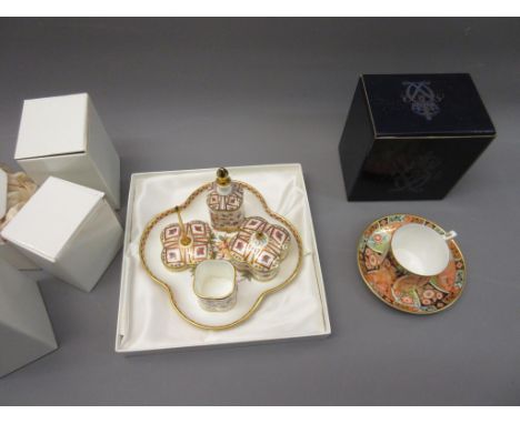 Royal Crown Derby Honeysuckle pattern five piece dressing table set, in original boxes together with a Regency Flower pattern