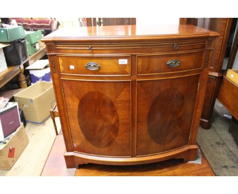 Suite of good quality reproduction drawing room furniture comprising:  a bow fronted side cabinet with pull-out slide above t