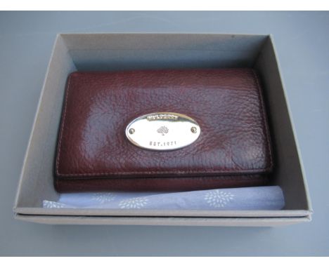 Mulberry brown leather purse, circa 1980's with original boxThe item can be shipped within the UK, but bare in mind it will b