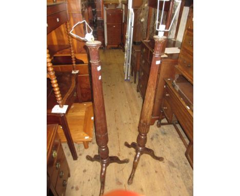 Pair of 20th Century mahogany fluted and carved column standard lamps on tripod bases, together with a reproduction mahogany 