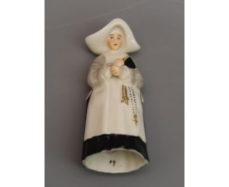 Royal Worcester candle snuffer in the form of a nun, puce mark 3.75'' 