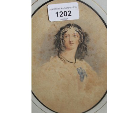 19th Century English school, watercolour, portrait miniature of a girl wearing a floral headband, 6.5ins x 4.75ins together w