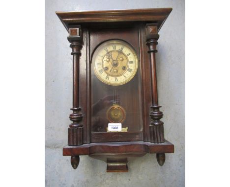 Small early 20th Century beech cased Vienna style wall clock, the painted enamel and gilded dial with Roman numerals and a tw