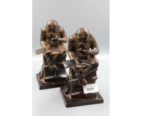 Pair of reproduction bronze patinated bookends in the form of monkeys reading from books 