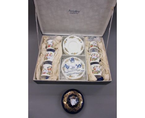 Boxed set of six modern Aynsley coffee cups and saucers, together with a blue glazed pottery inkwell 