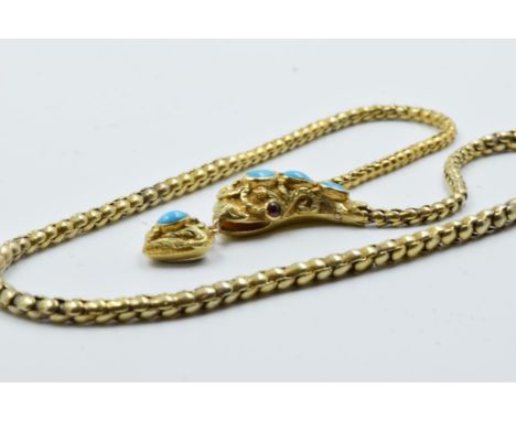 Victorian gold turquoise and cabochon garnet serpent necklace, 36cms long, 13.5gThis piece does show overall signs of general