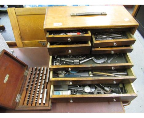Mid 20th Century engineer's tool cabinet containing a quantity of miscellaneous tools, together with a cased set of gauges by