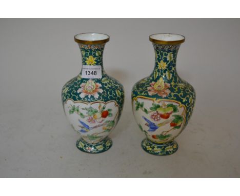 Pair of Chinese enamel decorated baluster form vases (one at fault), 8ins high 