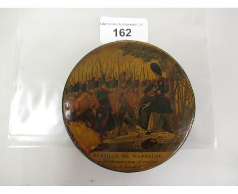 19th Century black lacquered papier mache snuff box, the lid decorated with a coloured print of the Battle of Waterloo, 3 and