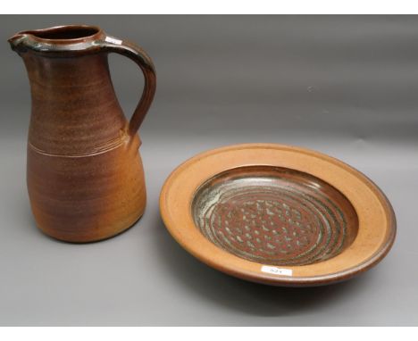 Muchelney Pottery (John Leach) stoneware dish, 14ins diameter, impressed marks and date 1999, together with a similar jug, 12