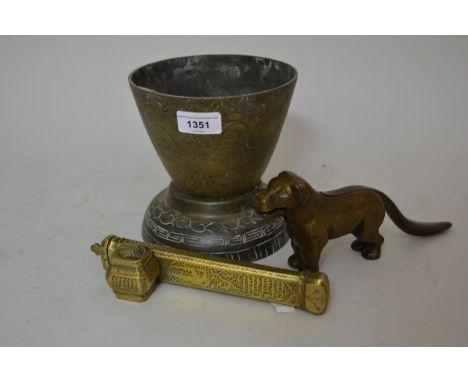 Middle Eastern brass scribes box, together with a brass jardiniere on stand and a metal dog form nut cracker 