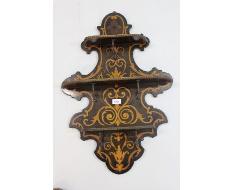 Late 19th / early 20th Century Continental shaped and inlaid wall bracket having three shelves and gilt metal shelf supports,